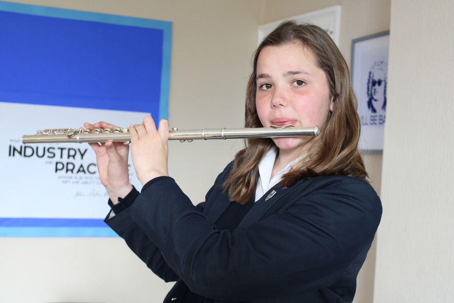 Dimity playing the flute